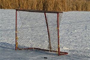 An outdoor ice hockey net